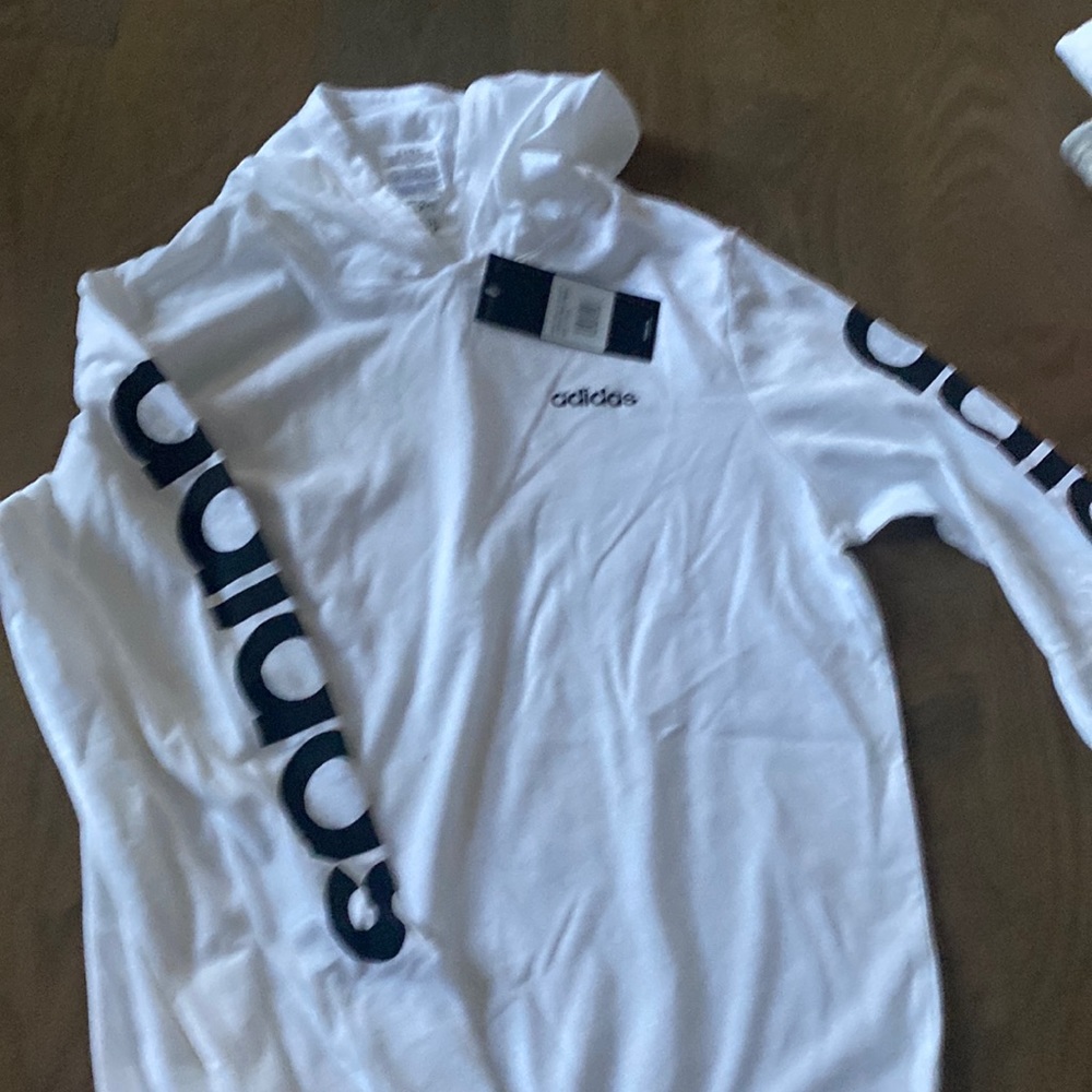 Brand new adidas hoodie. Size 14-16.